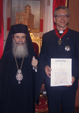  02/09/2010 Παρασημοφόρηση του Γενικού Γραμματέως του Π.Σ.Ε. από τον Πατριάρχη Ιεροσολύμων